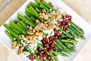 Asparagus with Pomegranate, Toasted Walnuts and Goats Milk Cheese